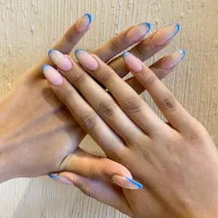 A perfect summer French manicure. I used a thin line of bright blue for the tip, giving it a fresh and subtle pop of color.
