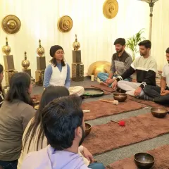 Leading a guided meditation for employees at an HCL BeWell event. We begin by centering ourselves, which prepares the mind and body for the sound healing experience to follow.