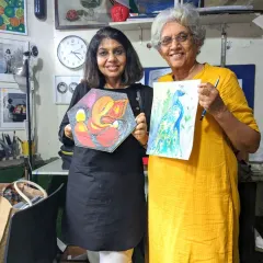 Art brings so much joy, no matter your age. Priyanka and Harinder ma'am, two of our wonderful hobby class students, proudly display their latest creations, a Ganesha painting and a watercolor peacock.