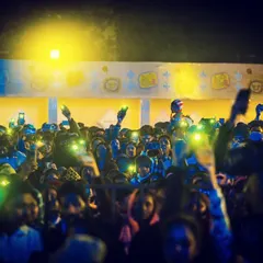 A sea of mobile flashlights creating a magical atmosphere at the Pithe Puli Utsav. We are always in awe of the love from our audience.