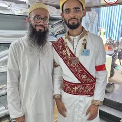 It brings me great joy to meet happy customers. This groom trusted me with his wedding saya kurta, providing all his measurements online after watching my video guide. He visited my store for the first time after his wedding, and his satisfaction is the biggest reward for my work.
