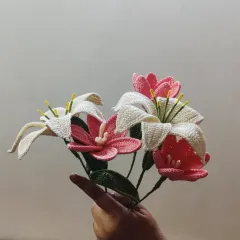 A beautiful, handcrafted bouquet of crochet lilies and tulips. These everlasting flowers are a perfect, sustainable gift that captures the beauty of fresh blooms without ever fading.