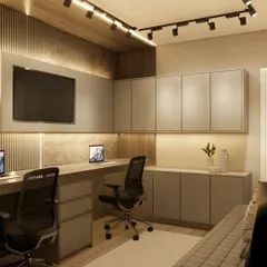 A side view of the dual-person home office, showing the depth of the desk and the extensive storage capacity of the custom-built cabinets.