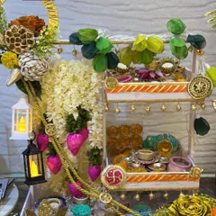 This custom Diwali hamper is what I call a 'bombastic' celebration in a tray. It combines traditional elements like floral garlands and lanterns with modern decor pieces, creating a truly unique and luxurious gift.
