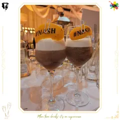 Our signature Espresso Cocktail, garnished with a custom hashtag printed on a dehydrated orange slice. It's a perfect blend of delicious flavor and Instagram-worthy presentation.