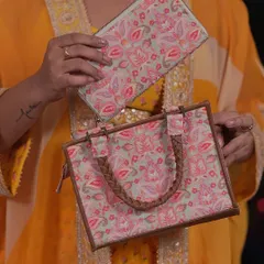 Bloom loud, bloom bold. This Wild Bloom handbag and matching wallet from Amyra is a botanical statement piece, perfect for days when your outfit needs a pop of personality.