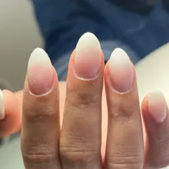 The classic baby boomer nail set. This timeless look features a seamless ombré blend from a soft pink base to a clean white tip, perfect for any occasion.