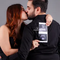 The first hello. Bringing your sonogram to the shoot is a wonderful way to make your session deeply personal. This pose beautifully incorporates the very first picture of your baby into your maternity portraits.