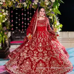 The bride, in all her splendor. I focus on capturing the grandeur of the moment as she twirls, her magnificent lehenga telling a story of tradition, joy, and the beginning of a beautiful forever.