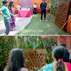 Guests participating in an "Air Stabilizer" game, a fun and challenging activity for all ages.