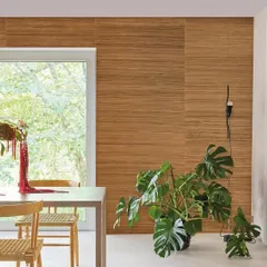 This wallcovering from the Intuition collection showcases the beauty of natural wood grain. The horizontal panels create a warm, modern, and minimalist look, perfect for a dining area with lots of natural light.