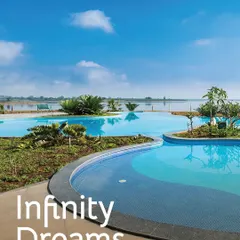 The stunning infinity pool at our Kabini resort seems to merge with the river, offering a truly dreamlike swimming experience.