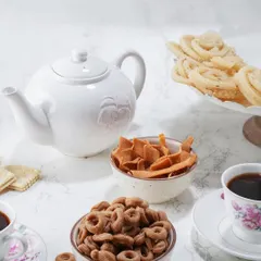 A beautiful spread for your coffee or tea time. My snacks like Kodbale and Ribbon Murukku are made to be shared and enjoyed with friends and family.