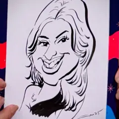 "When art exaggerates but still captures the real smile." A close-up of a caricature for a guest named Shailza.
