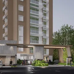 For this apartment building in Bengaluru, the design emphasizes green pockets and sculptural elements to create focal points. The entrance gate is designed with a modern, minimalist aesthetic, directing attention to the intricate details.