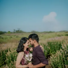 A quiet, intimate pre-wedding portrait in a field of wildflowers. These sessions are about capturing your connection in a peaceful, natural setting before the big day.