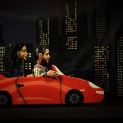 We also create custom puppets for special events. These two were part of a unique show set against a city skyline backdrop.