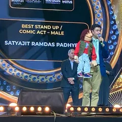 On stage at the WOW Awards Asia, accepting the award for 'Best Stand Up / Comic Act - Male'. It's an honor to be recognized in this category.