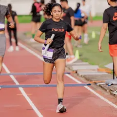 Speed and focus in the heat of competition. A track relay isn't just about running fast, it's about precision and teamwork. My coaching sharpens your explosive power for moments just like this.
