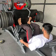 "You can't spell legendary without leg day." A heavy leg press, a great alternative to squats for building mass in the quads and glutes.
