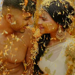 This is the beautiful chaos of a Haldi ceremony. It’s more than just a ritual; it’s an explosion of joy, laughter, and color. This intimate shot of the couple, lost in the moment and covered in petals, shows the fun and authentic energy I love to capture.