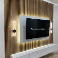 A clean and modern TV unit is my specialty. Here, I used a combination of fluted wood panels for texture and a floating white console for a minimalist look. The hidden backlighting gives it a premium feel and makes the wall a centerpiece.