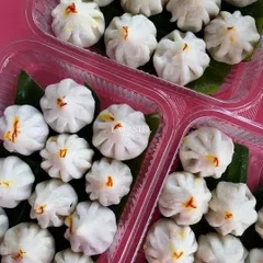 Getting your festive orders ready. I pack my homemade Ukdiche Modaks in these convenient, clear boxes to ensure they stay fresh and intact for your celebrations.