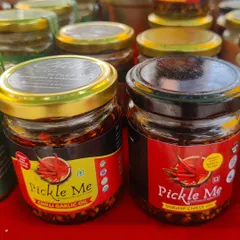 A look at our versatile Chilli Oils. We offer both a classic Chilli Garlic Oil and a unique Shrimp Chilly Oil to spice up your meals.