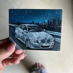 A closer look at the miniature BMW painting. I love the challenge of working on a small scale, focusing on getting all the details just right, from the headlights to the starry sky.
