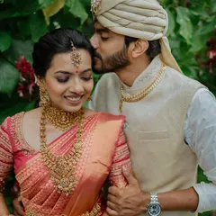 A gentle moment of affection against a backdrop of lush greenery. We love creating these serene and intimate couple portraits that you will cherish for a lifetime.
