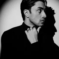Playing with shadows and profiles in this shot of Lakshya Parikh. The minimalist styling of the black turtleneck allows the focus to remain entirely on him.