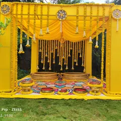 A Haldi ceremony should be full of life and color. We created this vibrant setup using a bold yellow frame, traditional marigold hangings, and a beautifully painted floor mat, designing a joyful space for this auspicious pre-wedding ritual.