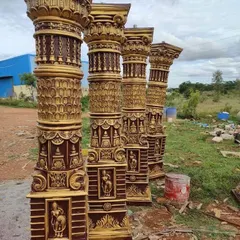 These are custom-made decorative pillars used for creating grand entrances and stages. The detailed, traditional design adds an element of grandeur to any event space.