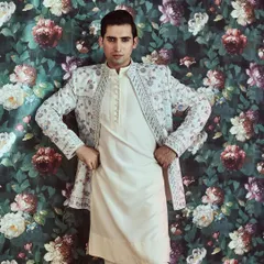 We customize both ethnic and western outfits, ensuring a perfect fit and a style that is uniquely yours. This Indo-Western ensemble is a prime example.