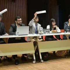 Our students participating as delegates in the Model United Nations, holding up placards for their assigned countries. This event is a true showcase of global citizenship.