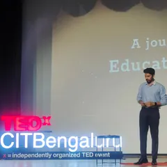 Another shot from my talk at TEDx CIT Bengaluru. The screen behind me reads "A journey of Education," as my talk focused on how illusion can be a powerful tool for learning and changing perspectives.
