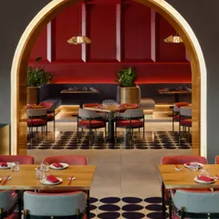We use arches not just as windows, but as passageways to frame views and guide guests through the restaurant, creating distinct zones within the open space.
