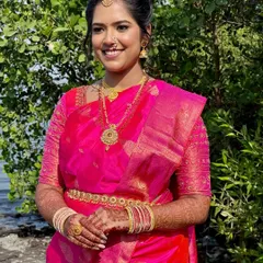 A vision in pink. For this Maharashtrian bride, I created a fresh, glowing look with soft eyes and a statement lip to perfectly balance her vibrant saree and traditional gold jewellery.