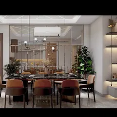 Another view of the Vasant Kunj dining space, highlighting the modern chandelier and the warm, inviting tones of the chairs against the sleek, reflective surfaces.