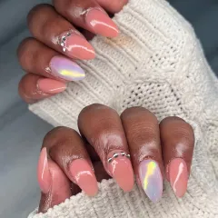 Another angle of the peach and chrome manicure, showing how the different elements come together for a look that is both soft and glamorous.