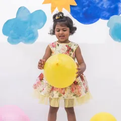 Playtime is always brighter in a fun dress. This yellow floral print dress has a tulle underskirt for a bit of extra flair, making it perfect for a party or just a day of fun.