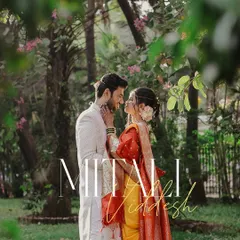 An intimate moment from a traditional Marathi wedding. We believe in capturing the quiet connections amidst the celebration, framed by the natural beauty of the outdoors.