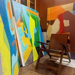 A glimpse of some large, vibrant abstract canvases in my studio. I use bold color-blocking with shades of blue, yellow, green, and orange to create energetic pieces that become the focal point of any room.