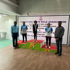 Our shooter Mishika Urs stands proudly on the podium after winning gold in the women's category at the Second Jagdale competition organized by the Karnataka State Rifle Association (KSRA).