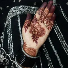 Another look at the gorgeous Eid henna stain, showing how it complements the festive attire.