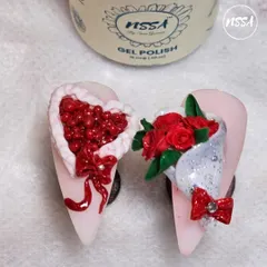 The quality of our NSSA gel polish and 3D carving gels is evident in this detailed Valentine's art. The colors are rich, and the gels hold their shape perfectly for intricate sculptures like this heart and rose bouquet.