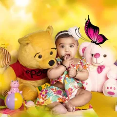 My editing services are not just for newborns. I can also enhance toddler photos by adding bright backgrounds, beloved characters like Winnie the Pooh, and fun digital elements like butterflies.