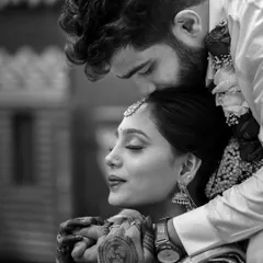 A tender, intimate black and white portrait capturing the deep connection between the couple.