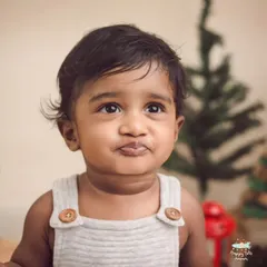 Even when they're not a fan of the cake smash, we find ways to capture their adorable personality, like this sweet little pout.