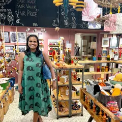 A happy customer in our Indiranagar store, wearing one of our elephant-print dresses. She shares her experience of shopping with us, highlighting the joy of finding ethically sourced, handmade products for the whole family under one roof.